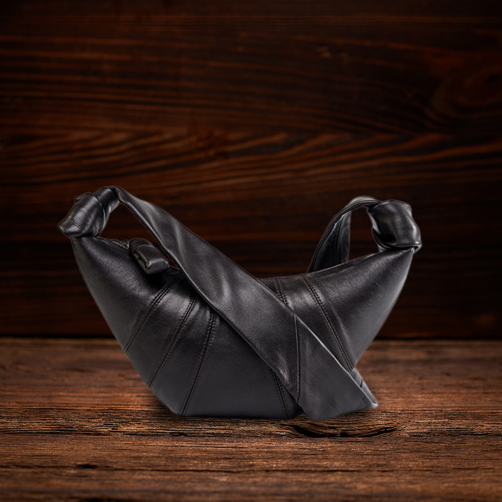 BERK | Minimalistische Ledertasche in Croissantform