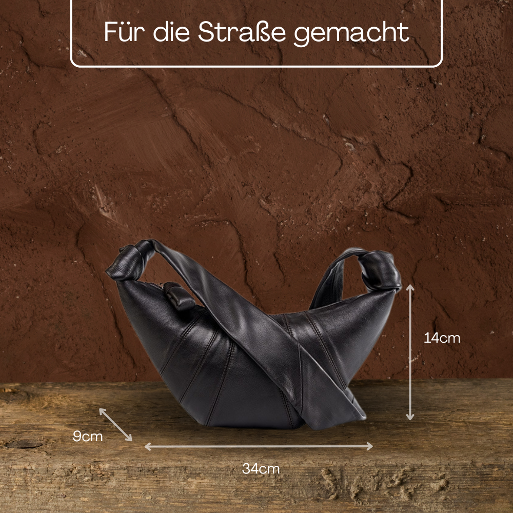 BERK | Minimalistische Ledertasche in Croissantform